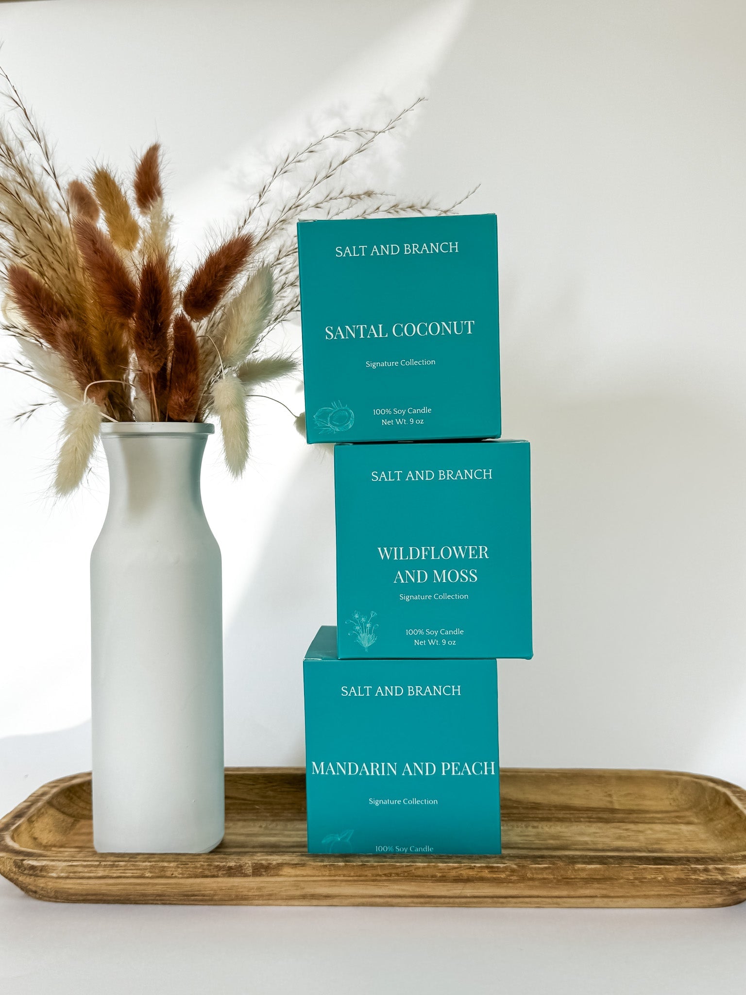 Teal Salt and Branch candle boxes stacked up