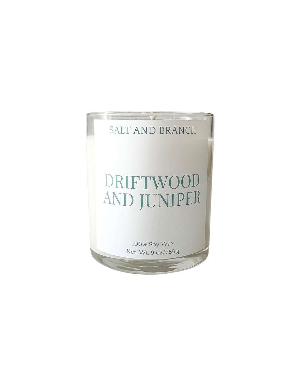 Driftwood and Juniper Soy Candle with white background, teal Salt and Branch