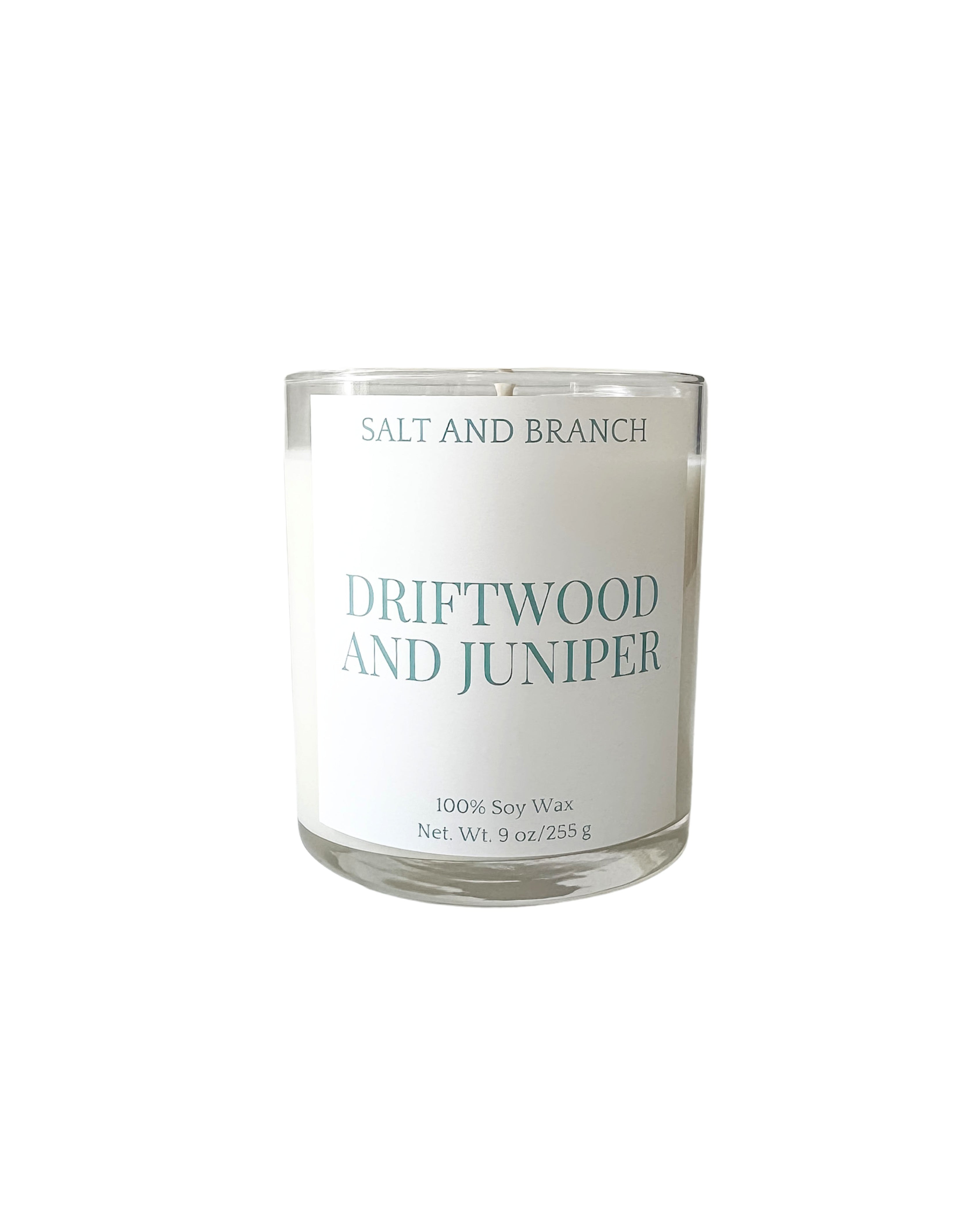 Driftwood and Juniper Soy Candle with white background, teal Salt and Branch