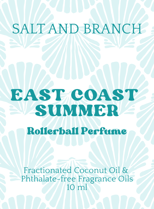 Product label for Salt and Branch East Coast Summer Rollerball Perfume, featuring teal text over a white background with a light blue seashell pattern.